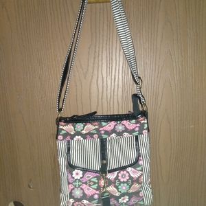 Pigeon and paisley striped purse